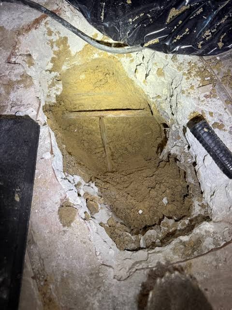Targeted spot access through concrete slab for precision pipe leak repair in Broomfield Colorado